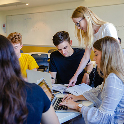 Students with teacher in classroom